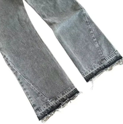 Gray jeans with lace trim on a white background