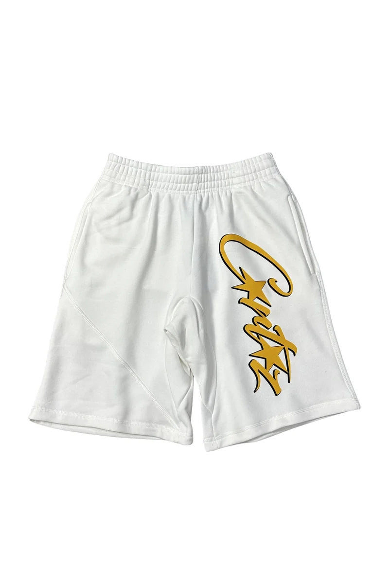 White shorts with yellow logo on a white background