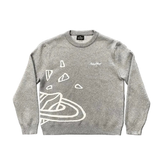 Gray Broken Planet sweater with white graphic design on a white background