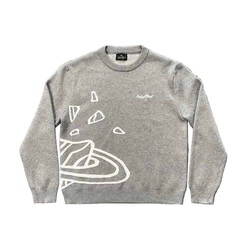 Gray Broken Planet sweater with white graphic design on a white background