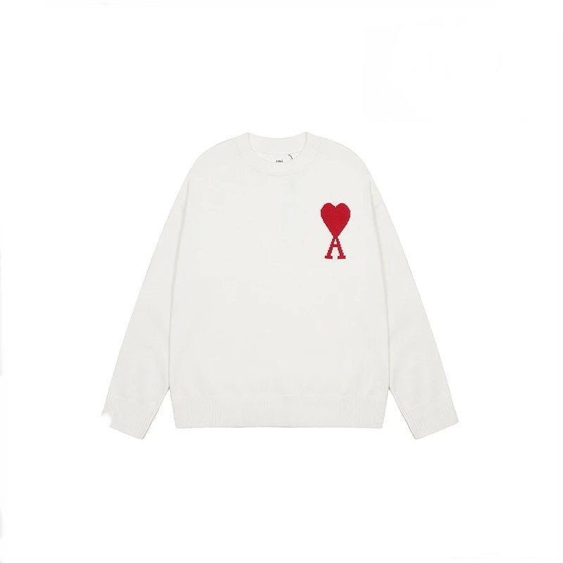 White AMI sweatshirt with a red heart and letter 'A' design on a white background
