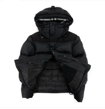 Black puffer jacket with hood on a white background, jacket half opened 