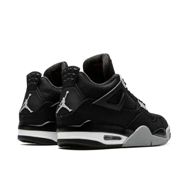 Air Jordan 4 Black and white sneakers with a prominent brand logo on a white background