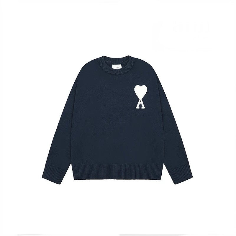 Navy blue AMI sweater with a white logo on a white background