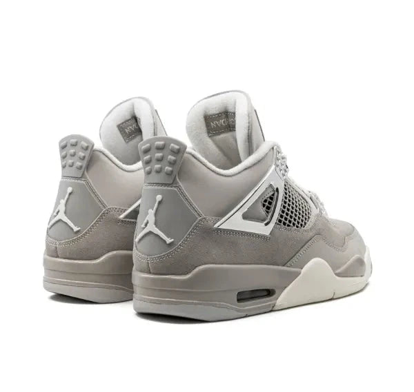 Pair of air Jordan 4 gray sneakers with a logo on a white background