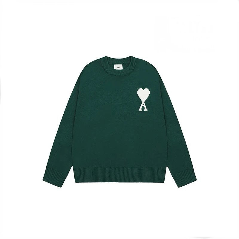 Green AMI sweater with a white logo on a white background