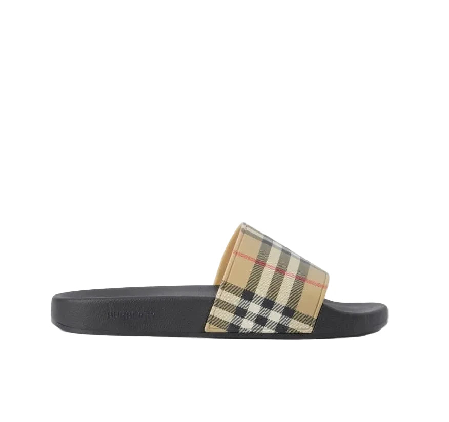A single Burberry slide sandal in beige, featuring the brand's signature check pattern strap on a clean white background.